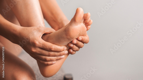 Foot pain, woman suffering from feet ache