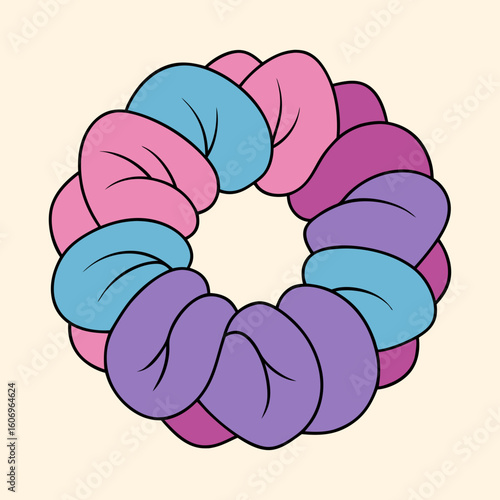Colorful scrunchie with pink, blue, and purple segments against a cream background
