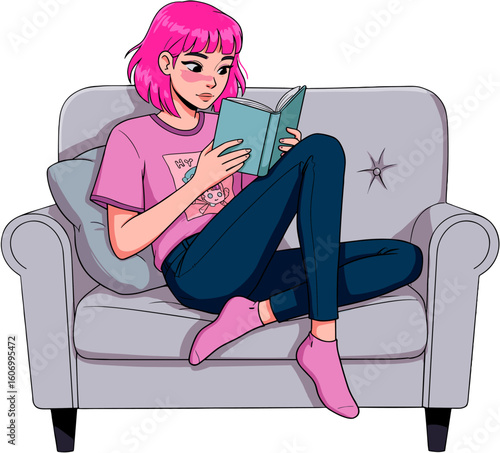 A woman immersed in reading a book while seated on a comfortable armchair.