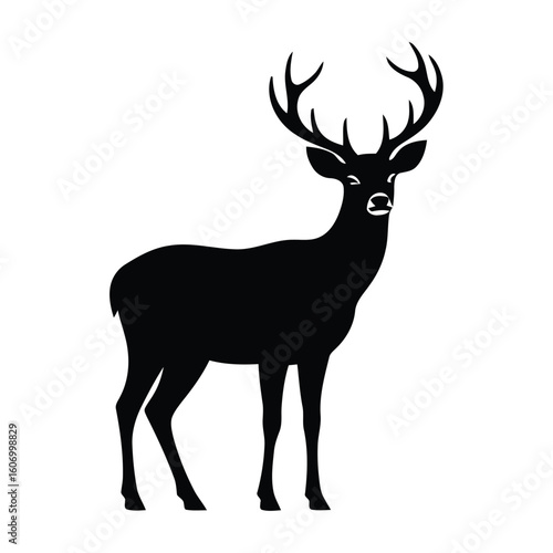 Majestic black silhouette of a stag with antlers
