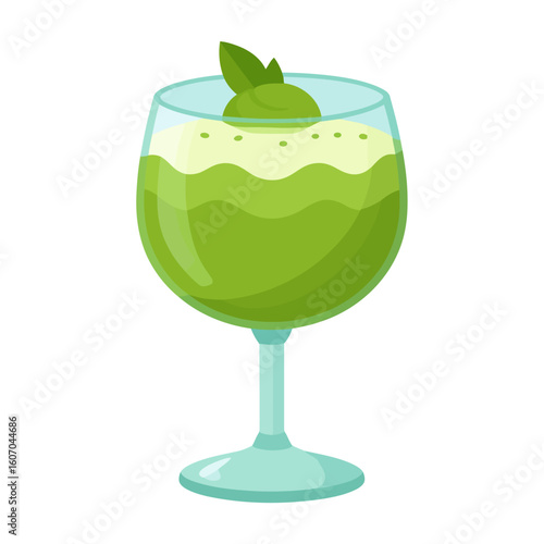 Stylized green smoothie in a light blue wine glass with a frothy top and mint garnish.