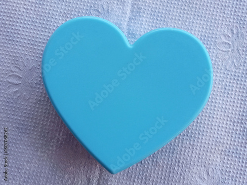 Top view  a large single heart shapes design valentine's day concept for stock photo. design blue hearts isolated on white texture background, symbol