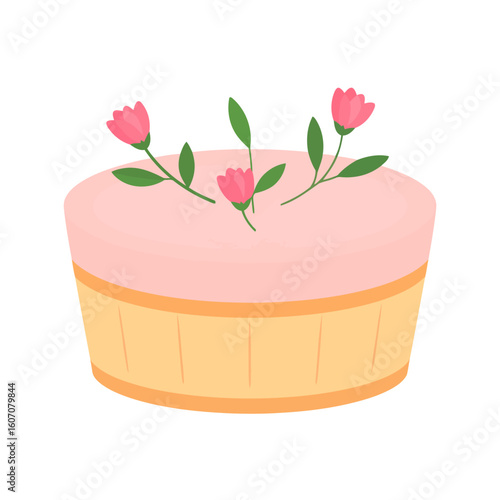 A charming round cake with smooth pink frosting, decorated with delicate pink flower sprigs.