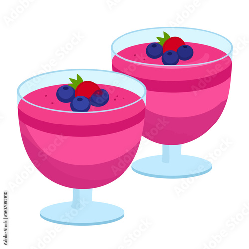 Two layered pink berry mousse desserts in stemmed glass bowls, garnished with fresh blueberries and mint.