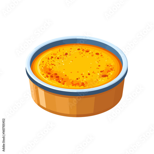 Golden yellow custard dessert in a round ramekin with a speckled caramelized topping.