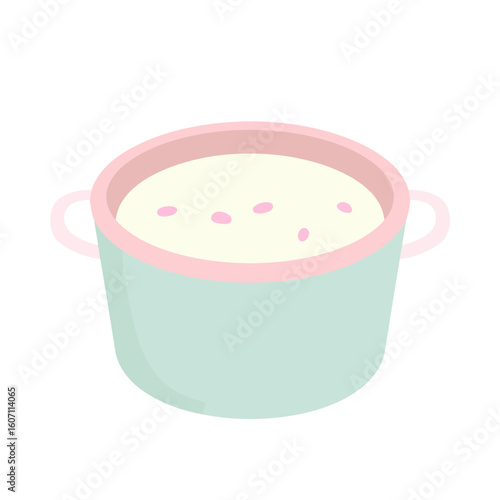 A cute pastel mint green pot with a pink rim, filled with creamy soup or porridge and small pink toppings.