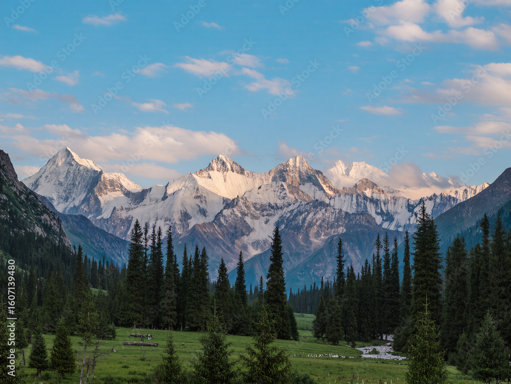 Fototapeta premium Majestic Snow-Capped Mountain Range with Pine Forest at Sunrise