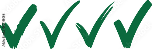 Four green hand drawn check marks tick approved