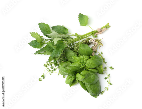 Different fresh green herbs isolated on white, top view