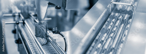 Tablet, Capsule counting machine conveyor in production line of pharmaceutical industry.