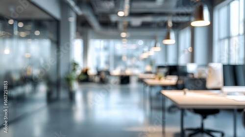 Blurred modern office interior background with an empty workspace. quiet business room features desk and blur effect, creating calm, professional feel