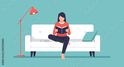 Woman Relaxing on Sofa Reading Book with Floor Lamp in Cozy Room