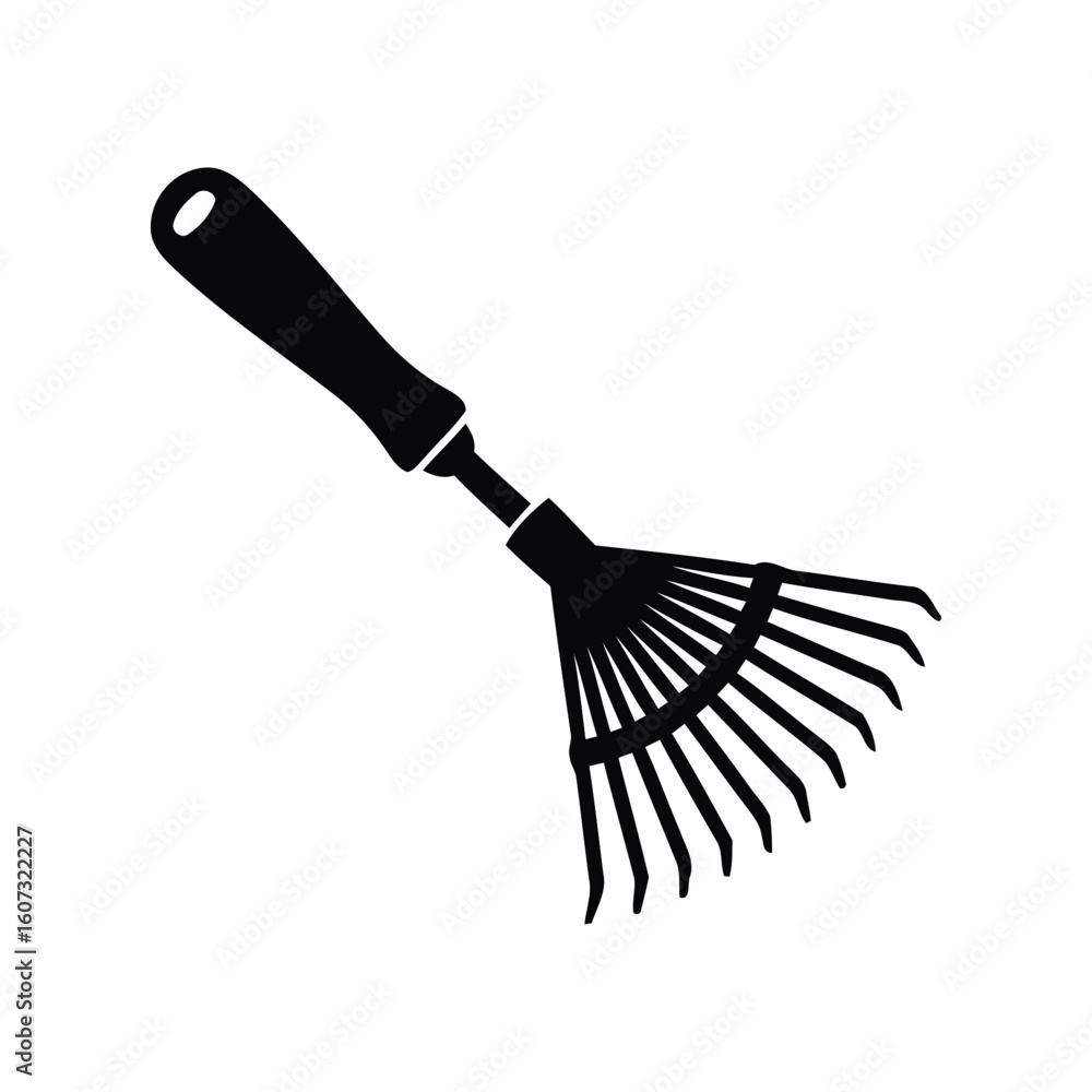 Obraz premium Silhouette of a handheld garden rake