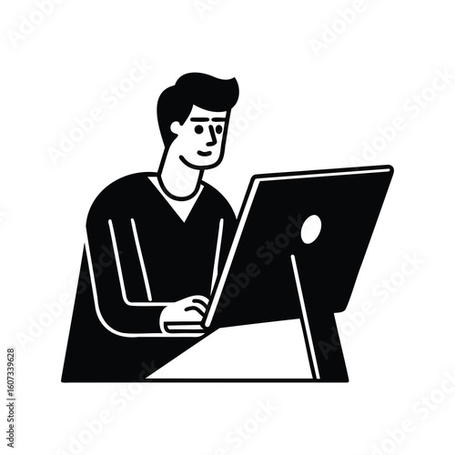 A man working on a computer workstation in a black and white image