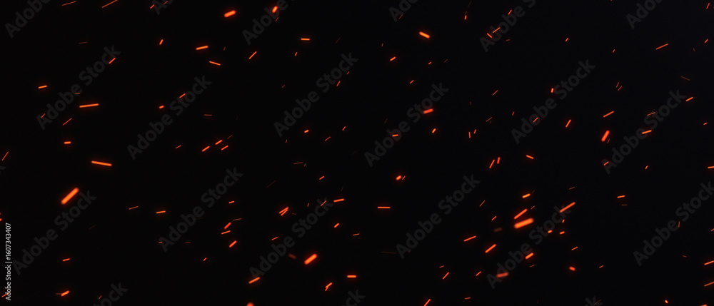 Hot burning fire sparks flying with the wind on a night sky. Glowing ...