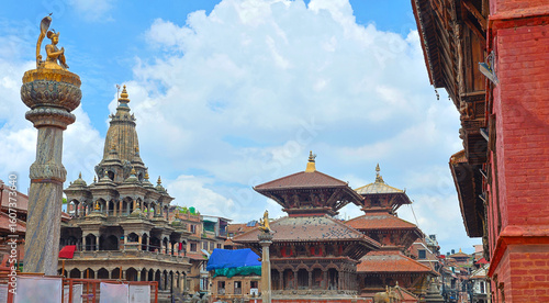 Foto Historic Patan Durbar Square, a UNESCO World Heritage Site in Nepal showcasing traditional Newar architecture and ancient temples ideal for travel, culture, and history-themed media