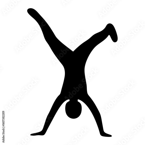 Silhouette of a person doing a cartwheel or handstand yoga pose