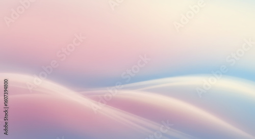 Elegant abstract background with soft flowing waves in a serene pastel color palette of pink and blue.