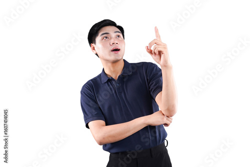 Obraz na plátne Eureka Moment: A young man, struck by an idea, points his finger upwards in a moment of inspiration and epiphany, embodying the spirit of innovation