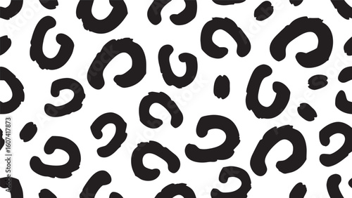 Black abstract shapes on white background pattern