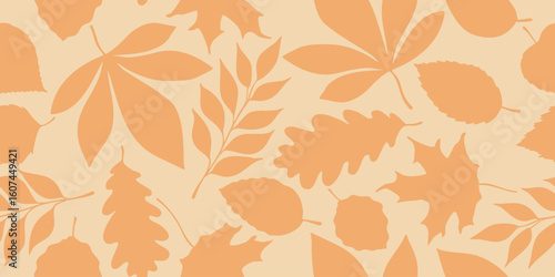Seamless pattern with autumn leaf silhouettes in flat minimal style