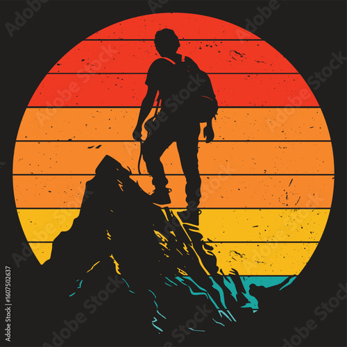 Climber summiting mountain at sunset silhouette