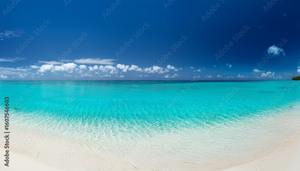 Fototapeta premium perfect tropical beach scene turquoise water meets clear sky over white sand horizon experience serene summer day with this breathtaking panorama