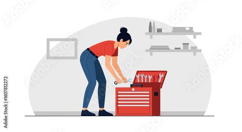 Skilled Technician Inspecting Wrenches From A Professional Toolbox Inside Workshop