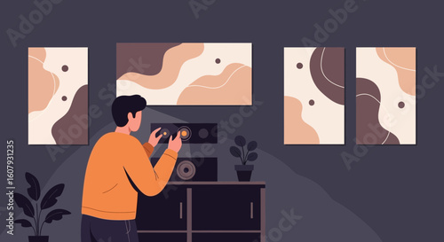 Young Man Adjusting Audio System With Abstract Art In Living Room