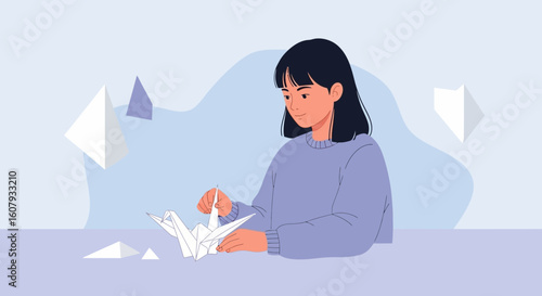 Young Woman Diligently Crafting Intricate Paper Crane Art At Her Home