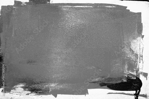 Fotografie Vibrant abstract composition with dark gray layers ink from paint roller marks, isolated on white background