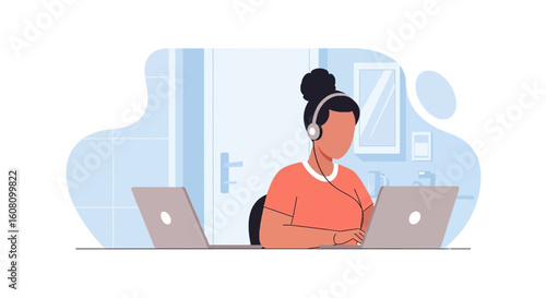 Woman working from home on two laptops, perfect for remote work and technology blogs.