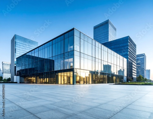 Modern glass office building complex at dawn