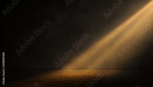 Dramatic spotlight illuminates a dark space