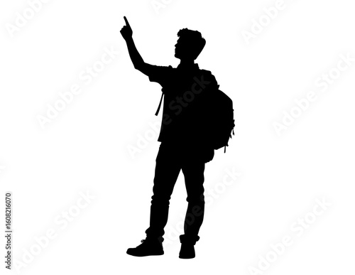 Silhouetted man with a backpack points up toward the sky. Perfect for inspirational content, travel blogs, adventure themes. A man in silhouette points up with backpack. Adventure awaits!
