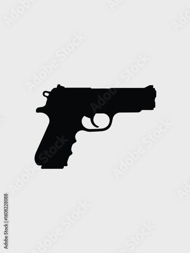 Silhouette of a classic semi automatic handgun against a plain background