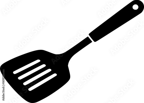 A sleek black spatula with ventilation slots and a hanging hole on a white backdrop
