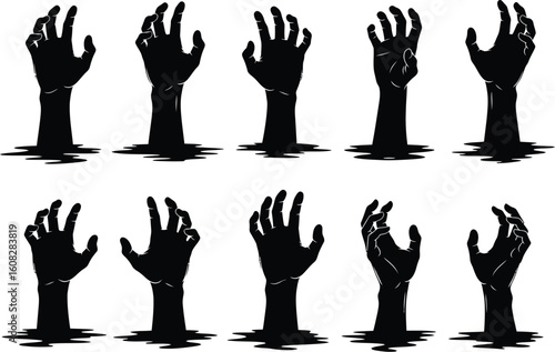 Collection of ten silhouetted zombie hands emerging from the ground in a spooky halloween horror scene
