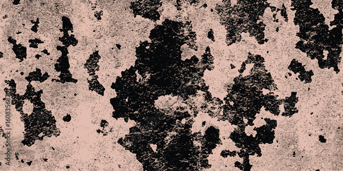 Abstract surface texture featuring grungy mottled appearance with a pinkish beige and black color palette