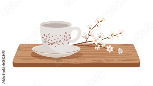 Still life tea cup with floral design and saucer on wooden board with flowering branch decor 100 chars