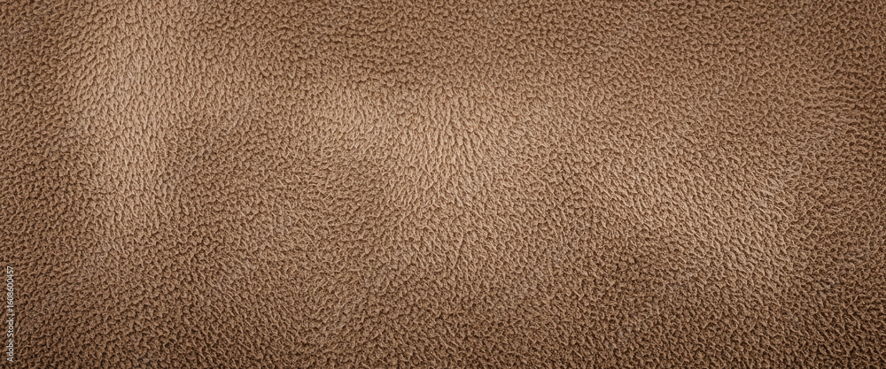 Fototapeta premium Brown textured background with subtle patterns creates a warm and organic feel, combining earthy tones and natural detail for comforting design themes or soft visual compositions.