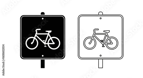 Two bicycle lane signs, one black and white, indicating designated pathway for cyclists.
