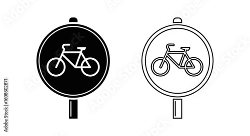 Two black and white bicycle lane signs, indicating permitted bicycle use.