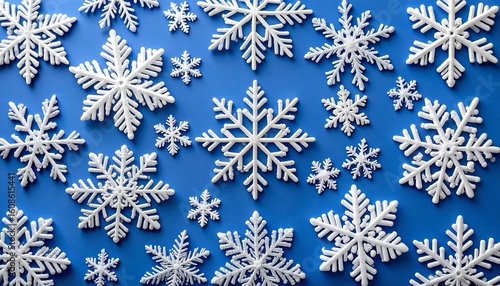 White snowflakes on blue background