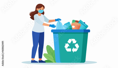 Woman in mask responsibly sorting recyclable waste into a green recycling bin for a cleaner planet