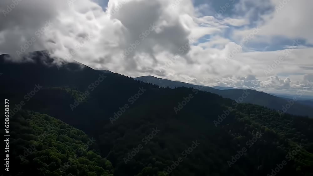 Mountain scenery under dramatic sky Mountain scenery under dramatic sky