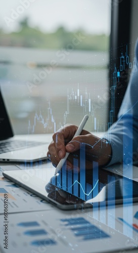 Business professional analyzing financial data on tablet. Modern office with digital charts overlay. Stock market and data analytics illustration.