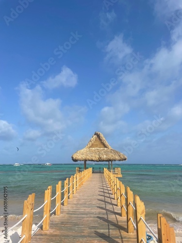 tropical beach with umbrellas and chairs