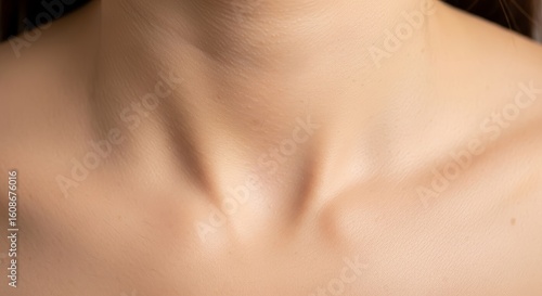 Wallpaper Mural Close-up view of smooth human chest area showing natural skin texture and collarbone definition with soft warm lighting Torontodigital.ca