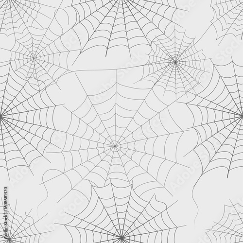 Minimal spiderweb pattern in soft gray tones, perfect for Halloween or spooky-themed designs.